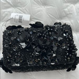 Black Floral Embellished Clutch by Mestiza
